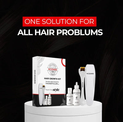 Haargroei kit met dermaroller, activator flesjes en doos tegen haarproblemen op zwarte achtergrond